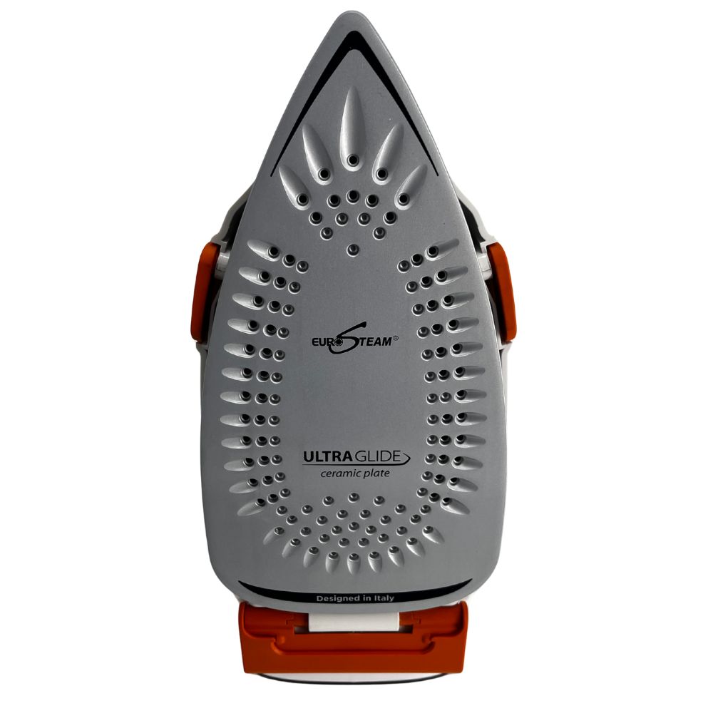 Close-up of the ceramic soleplate with 58 steam holes for even distribution. Close-up of the Eurosteam® Step Up Iron showcasing the ultra-glide ceramic soleplate and steam holes.